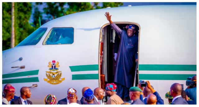 Photo of President Bola Ahmed Tinubu waving in Presidential jet